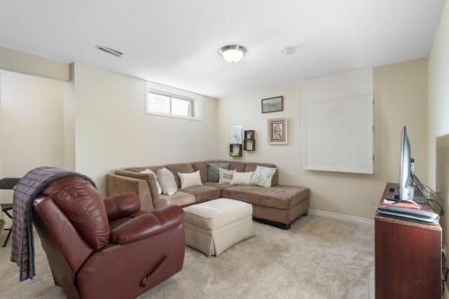 209 Hawkstone Drive Nw, Calgary, AB - Indoor Photo Showing Living Room