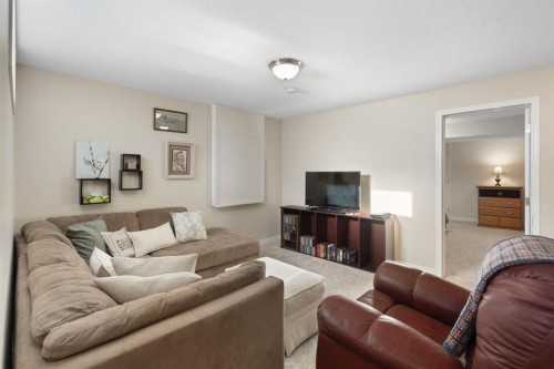 209 Hawkstone Drive Nw, Calgary, AB - Indoor Photo Showing Living Room