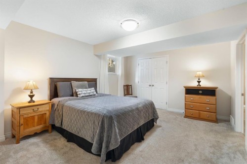 209 Hawkstone Drive Nw, Calgary, AB - Indoor Photo Showing Bedroom