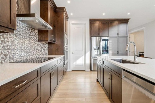548 Cranbrook Gardens Se, Calgary, AB - Indoor Photo Showing Kitchen With Upgraded Kitchen
