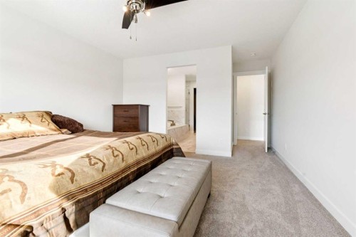 548 Cranbrook Gardens Se, Calgary, AB - Indoor Photo Showing Bedroom
