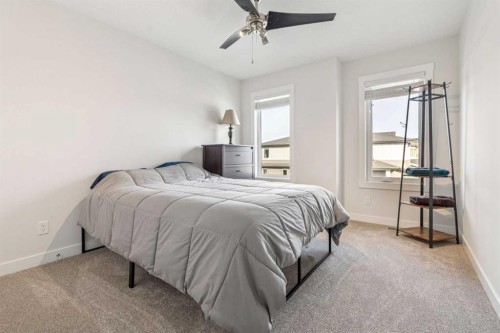 548 Cranbrook Gardens Se, Calgary, AB - Indoor Photo Showing Bedroom