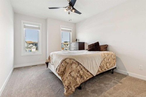 548 Cranbrook Gardens Se, Calgary, AB - Indoor Photo Showing Bedroom