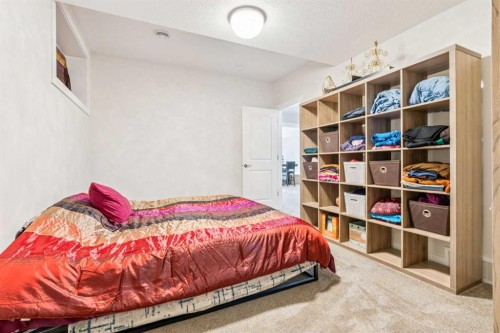 548 Cranbrook Gardens Se, Calgary, AB - Indoor Photo Showing Bedroom