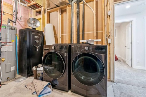 548 Cranbrook Gardens Se, Calgary, AB - Indoor Photo Showing Laundry Room