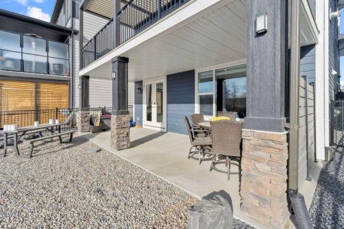 548 Cranbrook Gardens Se, Calgary, AB - Outdoor With Balcony With Deck Patio Veranda