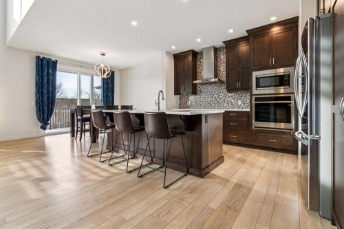 548 Cranbrook Gardens Se, Calgary, AB - Indoor Photo Showing Kitchen With Upgraded Kitchen
