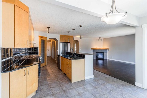 173 Silverado Plains Close Sw, Calgary, AB - Indoor Photo Showing Kitchen With Stainless Steel Kitchen