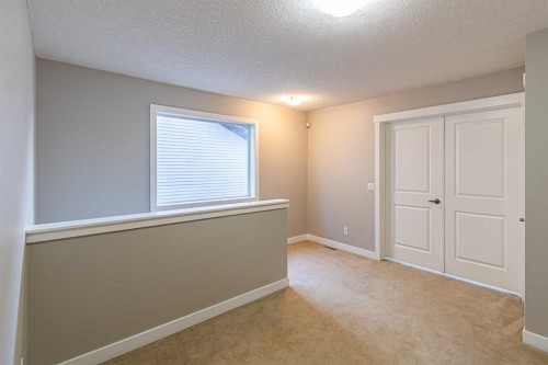 173 Silverado Plains Close Sw, Calgary, AB - Indoor Photo Showing Other Room