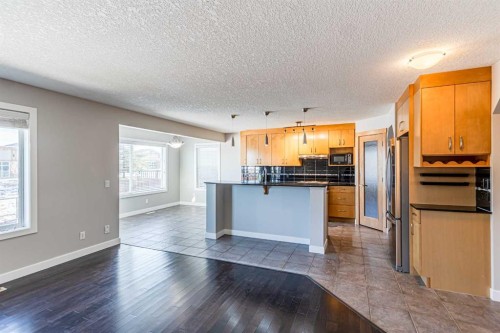 173 Silverado Plains Close Sw, Calgary, AB - Indoor Photo Showing Kitchen