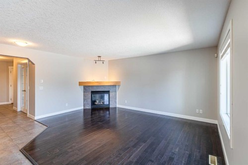 173 Silverado Plains Close Sw, Calgary, AB - Indoor With Fireplace