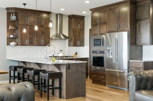 260 Boulder Creek Crescent Se, Langdon, AB - Indoor Photo Showing Kitchen With Stainless Steel Kitchen With Upgraded Kitchen