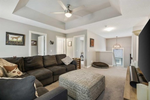 260 Boulder Creek Crescent Se, Langdon, AB - Indoor Photo Showing Living Room