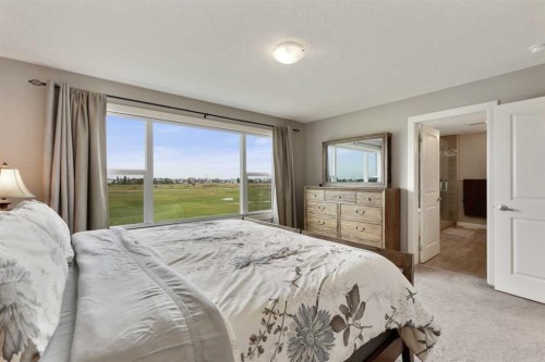 260 Boulder Creek Crescent Se, Langdon, AB - Indoor Photo Showing Bedroom