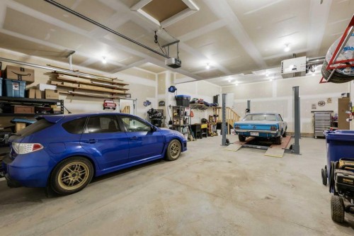 260 Boulder Creek Crescent Se, Langdon, AB - Indoor Photo Showing Garage