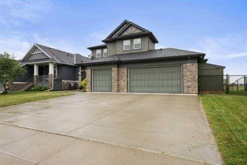 260 Boulder Creek Crescent Se, Langdon, AB - Outdoor With Facade