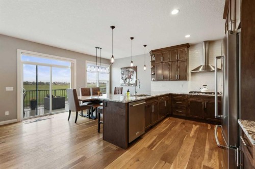 260 Boulder Creek Crescent Se, Langdon, AB - Indoor Photo Showing Kitchen With Upgraded Kitchen