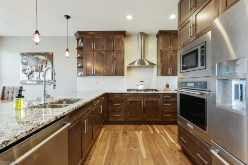 260 Boulder Creek Crescent Se, Langdon, AB - Indoor Photo Showing Kitchen With Stainless Steel Kitchen With Double Sink With Upgraded Kitchen