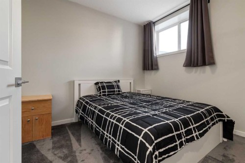 577 Masters Road Se, Calgary, AB - Indoor Photo Showing Bedroom