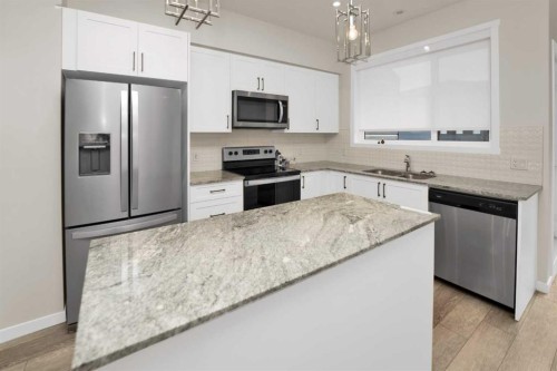 6529 Country Hills Boulevard Ne, Calgary, AB - Indoor Photo Showing Kitchen With Stainless Steel Kitchen With Double Sink With Upgraded Kitchen