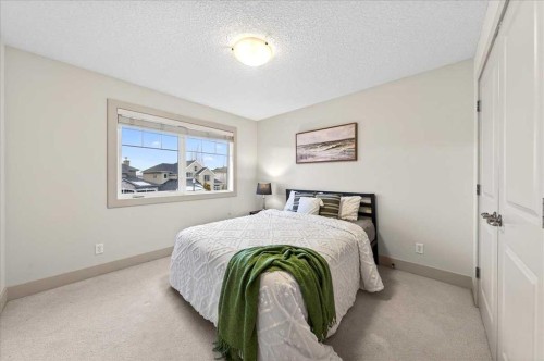 10 Discovery Ridge Way Sw, Calgary, AB - Indoor Photo Showing Bedroom
