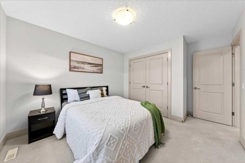 10 Discovery Ridge Way Sw, Calgary, AB - Indoor Photo Showing Bedroom