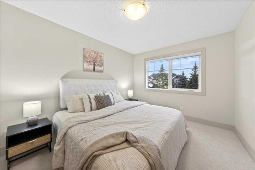 10 Discovery Ridge Way Sw, Calgary, AB - Indoor Photo Showing Bedroom