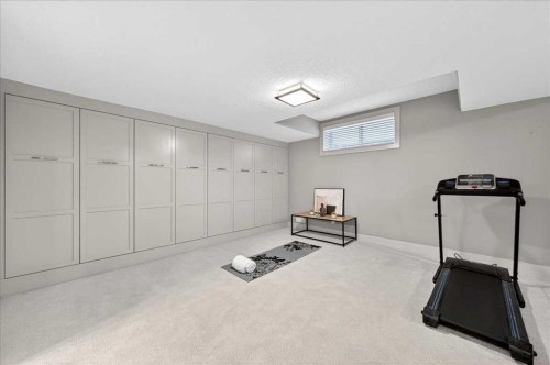 10 Discovery Ridge Way Sw, Calgary, AB - Indoor Photo Showing Gym Room