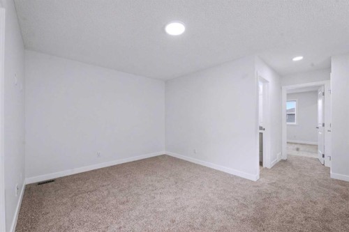 526 Wolf Willow Boulevard Se, Calgary, AB - Indoor Photo Showing Other Room