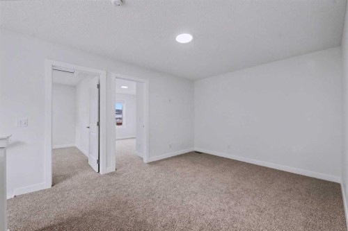526 Wolf Willow Boulevard Se, Calgary, AB - Indoor Photo Showing Other Room