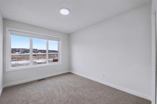 526 Wolf Willow Boulevard Se, Calgary, AB - Indoor Photo Showing Other Room