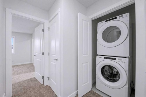 526 Wolf Willow Boulevard Se, Calgary, AB - Indoor Photo Showing Laundry Room