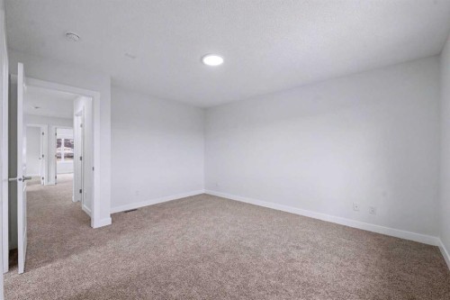 526 Wolf Willow Boulevard Se, Calgary, AB - Indoor Photo Showing Other Room