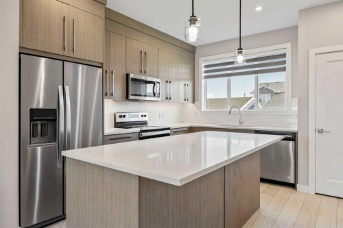 204 Chelsea Manor, Chestermere, AB - Indoor Photo Showing Kitchen With Stainless Steel Kitchen With Upgraded Kitchen