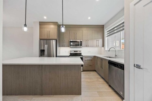 204 Chelsea Manor, Chestermere, AB - Indoor Photo Showing Kitchen With Stainless Steel Kitchen With Upgraded Kitchen