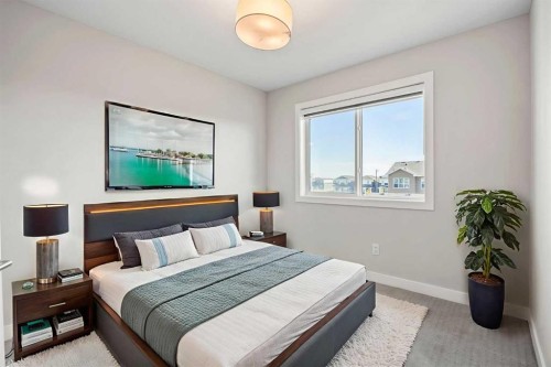 204 Chelsea Manor, Chestermere, AB - Indoor Photo Showing Bedroom
