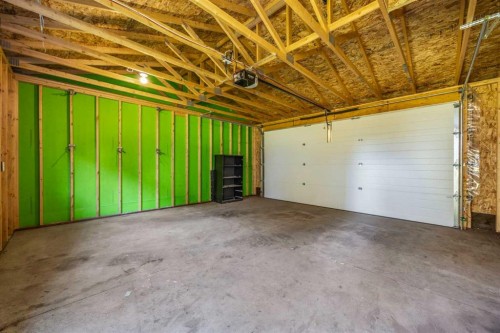 204 Chelsea Manor, Chestermere, AB - Indoor Photo Showing Garage