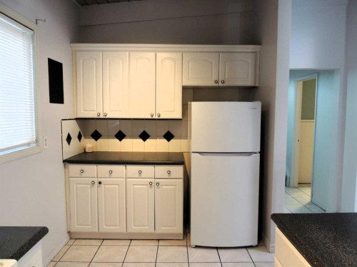 2713 Canmore Road Nw, Calgary, AB - Indoor Photo Showing Kitchen