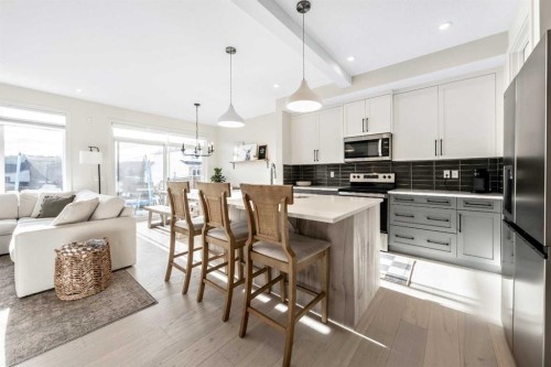 84 Mill Road, Cochrane, AB - Indoor Photo Showing Kitchen With Stainless Steel Kitchen With Upgraded Kitchen