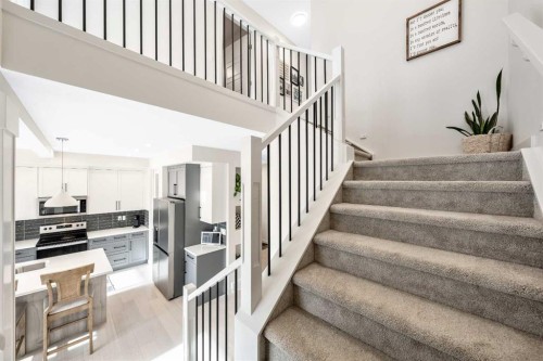 84 Mill Road, Cochrane, AB - Indoor Photo Showing Other Room