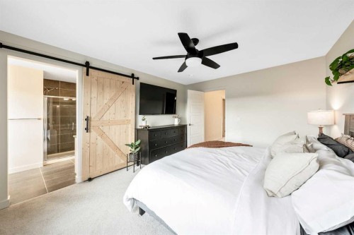 84 Mill Road, Cochrane, AB - Indoor Photo Showing Bedroom