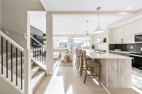 84 Mill Road, Cochrane, AB - Indoor Photo Showing Kitchen With Upgraded Kitchen
