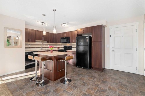 1305-755 Copperpond Boulevard Se, Calgary, AB - Indoor Photo Showing Kitchen