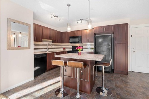 1305-755 Copperpond Boulevard Se, Calgary, AB - Indoor Photo Showing Kitchen