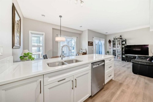 803-250 Fireside View, Cochrane, AB - Indoor Photo Showing Kitchen With Double Sink