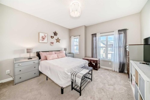 803-250 Fireside View, Cochrane, AB - Indoor Photo Showing Bedroom