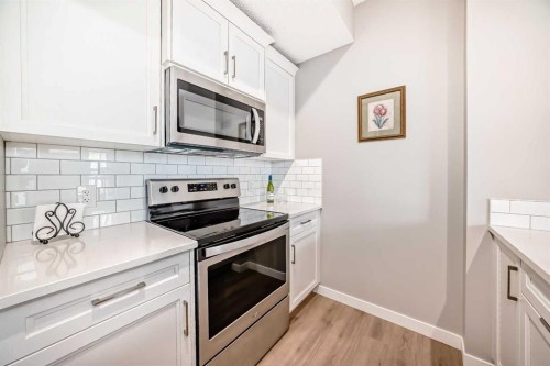 803-250 Fireside View, Cochrane, AB - Indoor Photo Showing Kitchen