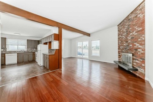 6527 58 Street Nw, Calgary, AB - Indoor With Fireplace