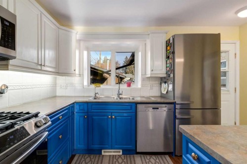 1328 Craig Road Sw, Calgary, AB - Indoor Photo Showing Kitchen With Stainless Steel Kitchen With Double Sink