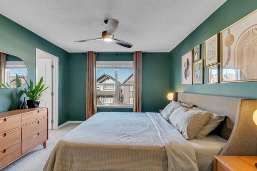 84 Masters Heights Se, Calgary, AB - Indoor Photo Showing Bedroom